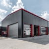Neubau einer Halle als Stahlkonstruktion mit Sandwich-Paneelen zur Erweiterung der Werkstatt für den Autoservice Macke in Peine.